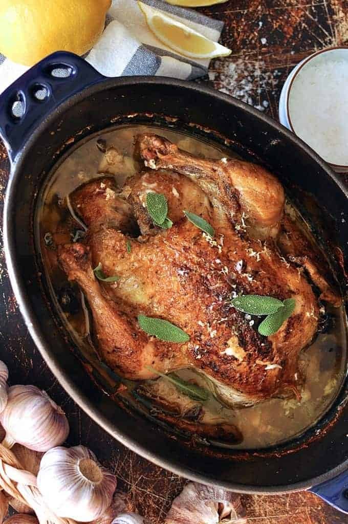 Jamie Oliver's Chicken in Milk in a casserole pot, fresh out of the oven ready for serving.