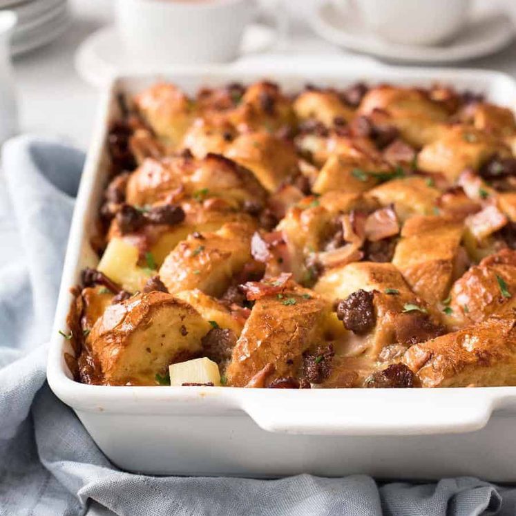 Sausage and Bacon Country Breakfast Casserole in a white dish, ready to be served.