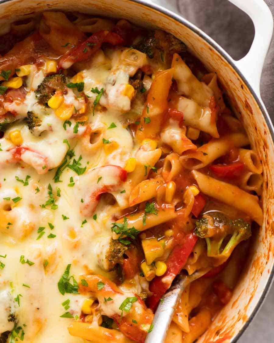 Overhead close up of One Pot Vegetable Pasta (healthy pasta recipe) in a white pot, fresh off the stove ready to be served