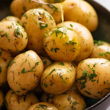 Drizzling butter of Baby Potatoes with Butter & Herbs