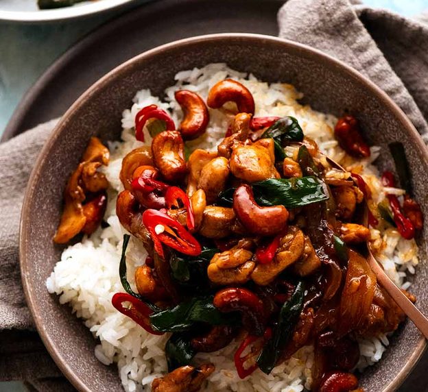 Thai Cashew Chicken Stir Fry on jasmine rice in a bowl, ready to be eaten