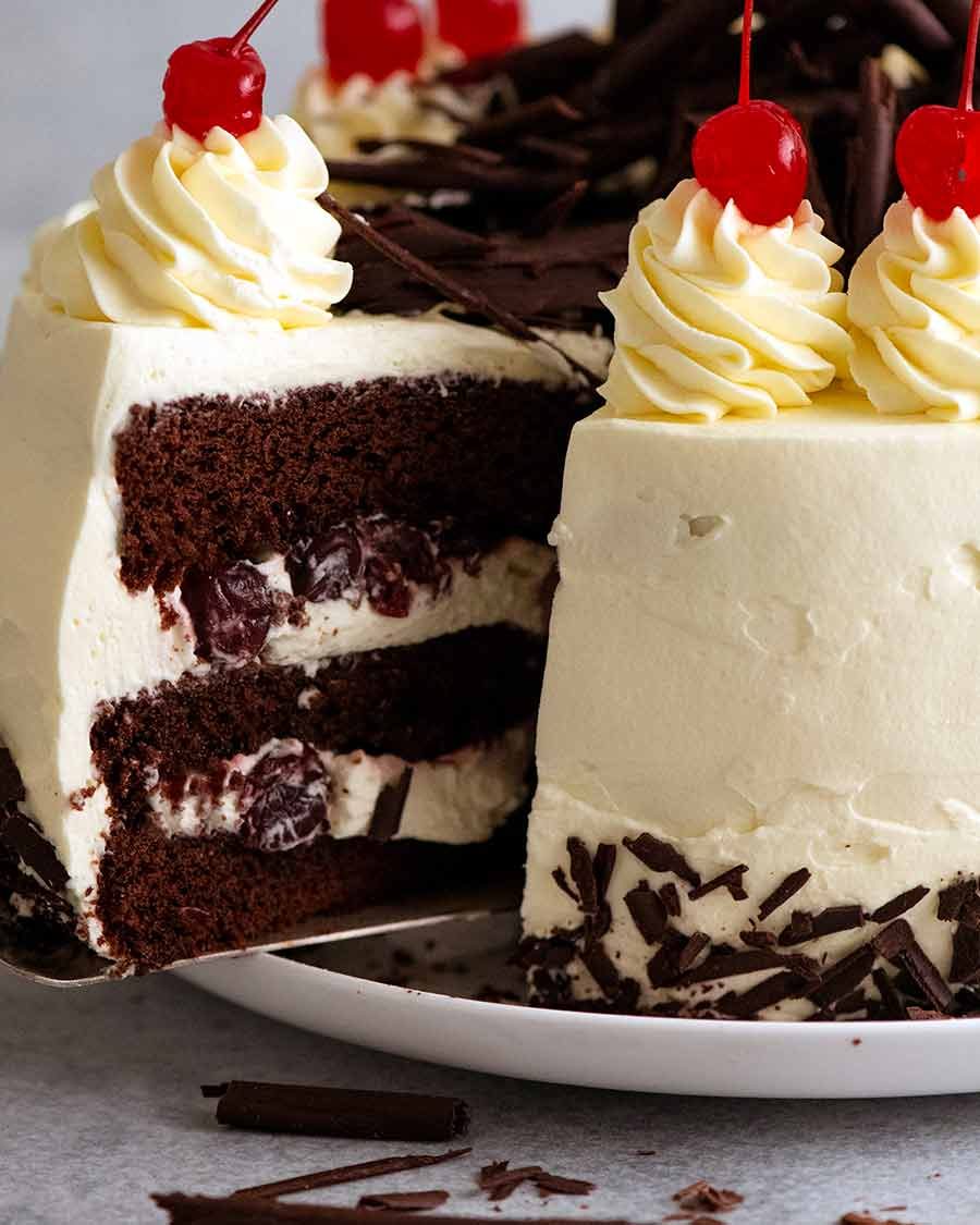 Close up of a slice of Black Forest Cake being pulled out